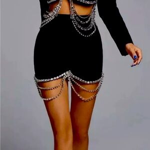 Stunning Bella Barnett black mini skirt with jeweled bottom